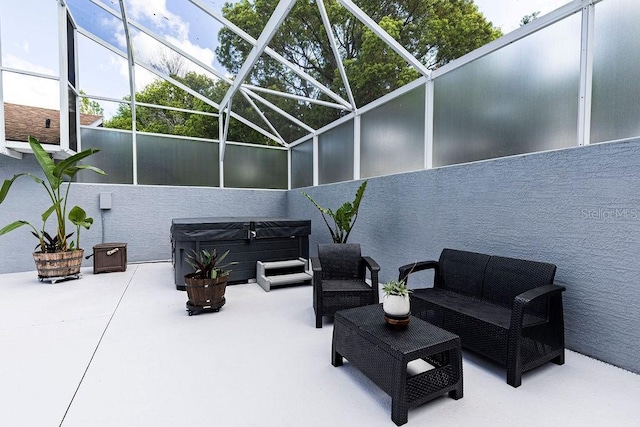 11619 Lane Park Rd, Tavares, FL 32778 - view of patio featuring a hot tub, glass enclosure, and an outdoor hangout area