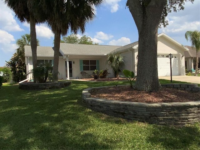 664 San Pedro Dr, The Villages, FL 32159 - ranch-style house featuring driveway, an attached garage, stucco siding, and a front yard