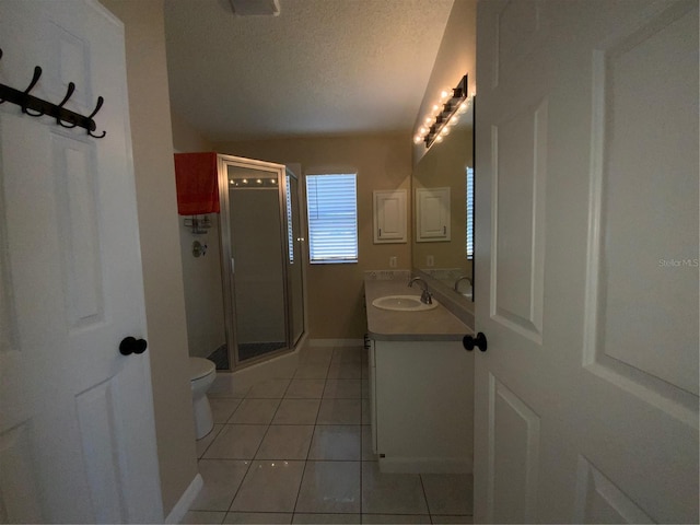 664 San Pedro Dr, The Villages, FL 32159 - full bath with a shower stall, tile patterned floors, vanity, and a textured ceiling