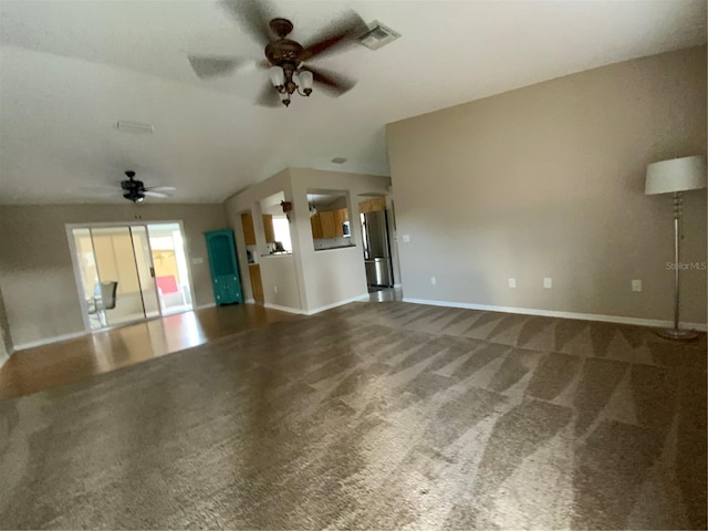 664 San Pedro Dr, The Villages, FL 32159 - unfurnished living room with baseboards, carpet floors, visible vents, and a ceiling fan
