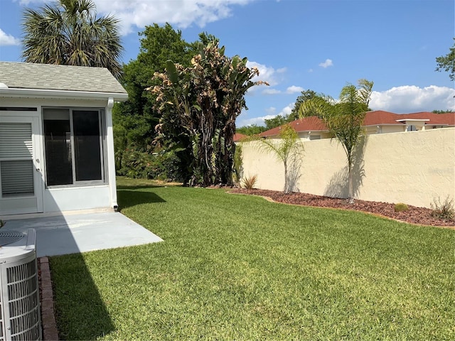 664 San Pedro Dr, The Villages, FL 32159 - view of yard featuring central air condition unit and fence
