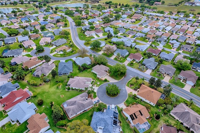 725 Beldon Ct, The Villages, FL 32162 - aerial view of property's location with a nearby body of water and nearby suburban area