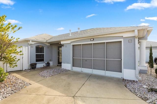 1917 Peachtree Ave, The Villages, FL 32162 - single story home featuring stucco siding, concrete driveway, a garage, and roof with shingles