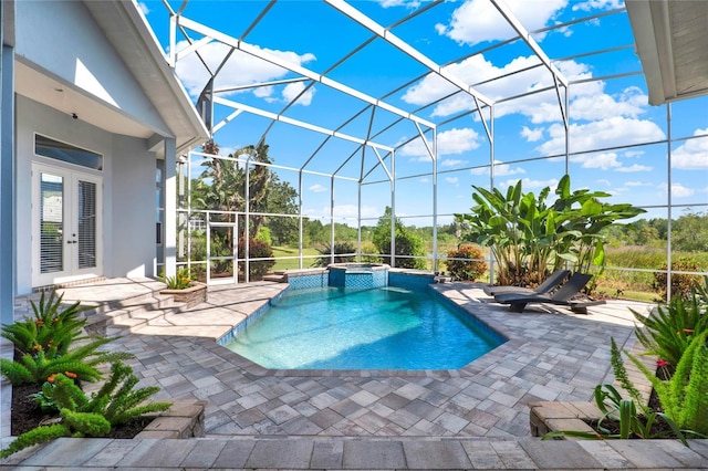 13112 Luntz Point Ln, Windermere, FL 34786 - view of pool with a patio, glass enclosure, a pool with connected hot tub, and french doors
