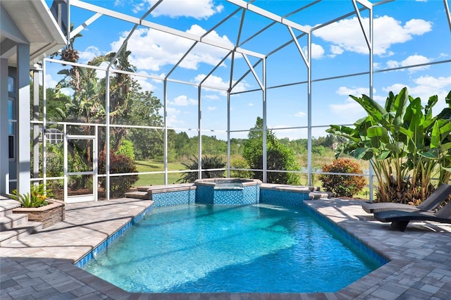 13112 Luntz Point Ln, Windermere, FL 34786 - view of pool with a patio area, a lanai, and a pool with connected hot tub