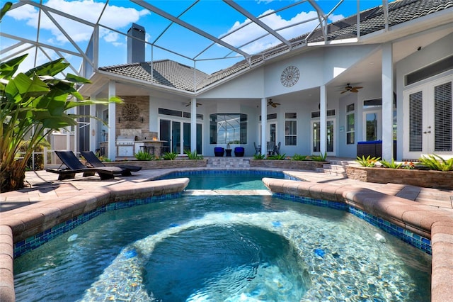 13112 Luntz Point Ln, Windermere, FL 34786 - view of pool featuring french doors, exterior kitchen, ceiling fan, and a patio