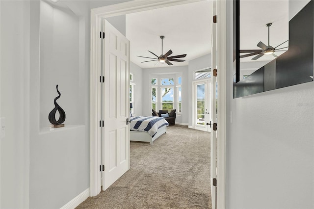 13112 Luntz Point Ln, Windermere, FL 34786 - carpeted bedroom with access to exterior, baseboards, and a ceiling fan
