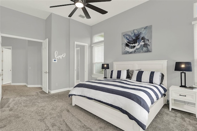 13112 Luntz Point Ln, Windermere, FL 34786 - bedroom with carpet flooring, baseboards, and ceiling fan