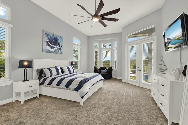 13112 Luntz Point Ln, Windermere, FL 34786 - bedroom featuring access to exterior, light colored carpet, french doors, baseboards, and ceiling fan