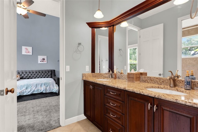 13112 Luntz Point Ln, Windermere, FL 34786 - bathroom with double vanity, tile patterned floors, ensuite bath, and ceiling fan