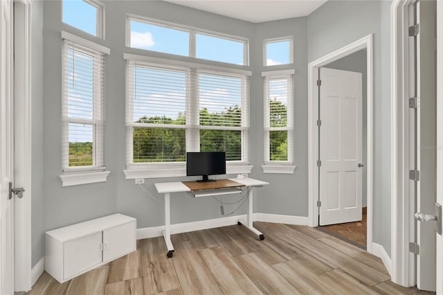 13112 Luntz Point Ln, Windermere, FL 34786 - office area with light wood-style flooring and baseboards