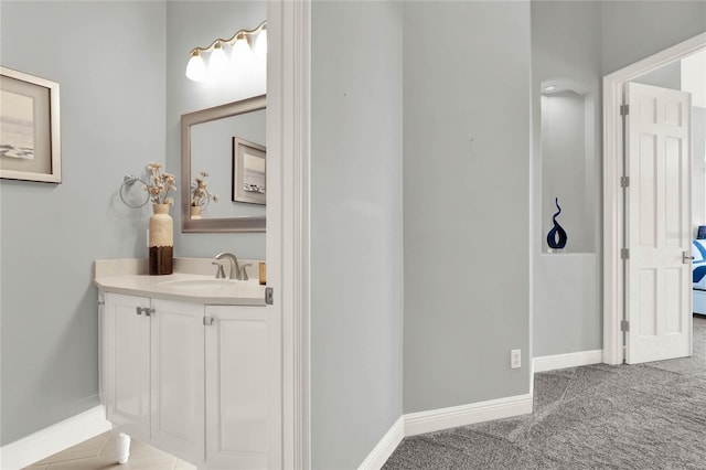 13112 Luntz Point Ln, Windermere, FL 34786 - bathroom featuring vanity and baseboards