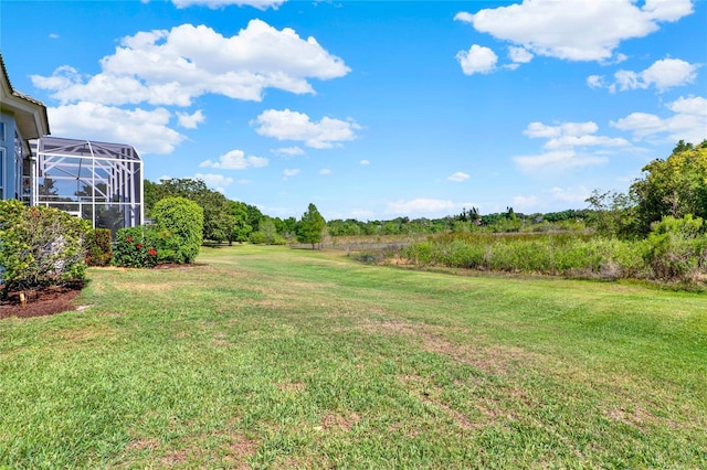 13112 Luntz Point Ln, Windermere, FL 34786 - view of grassy yard featuring a lanai