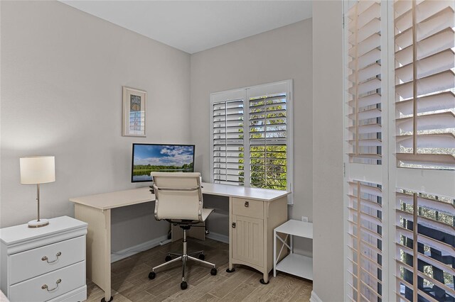 5300 S Atlantic Ave Unit 16-202, New Smyrna Beach, FL 32169 - office area with baseboards and light wood-type flooring