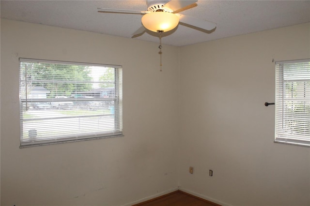 5177 Edwina St, Orlando, FL 32811 - unfurnished room featuring baseboards, wood finished floors, and a ceiling fan