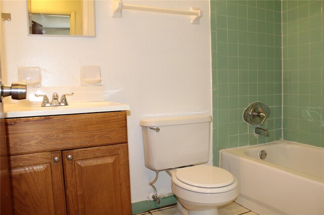 5177 Edwina St, Orlando, FL 32811 - bathroom featuring toilet, shower / tub combination, tile patterned flooring, and vanity