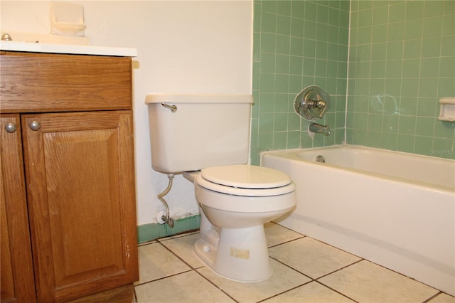 5177 Edwina St, Orlando, FL 32811 - bathroom with vanity, toilet, tile patterned flooring, and washtub / shower combination