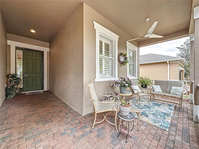view of patio / terrace featuring covered porch and a ceiling fan
