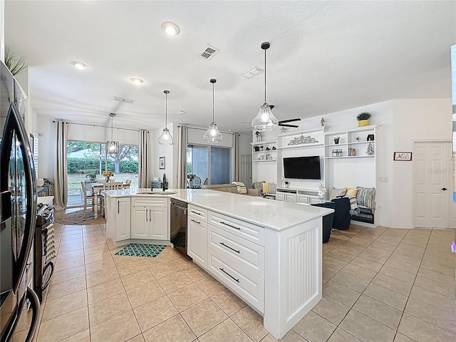 kitchen featuring white cabinetry, light tile patterned flooring, visible vents, a ceiling fan, and black appliances