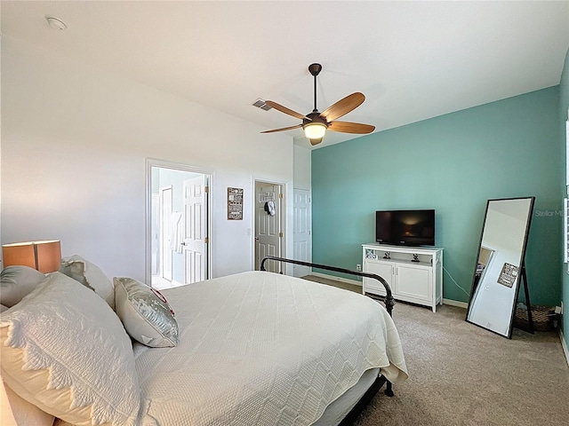 bedroom with baseboards, visible vents, a ceiling fan, and light colored carpet
