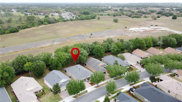 birds eye view of property with a residential view and a rural view