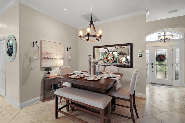 dining area with ornamental molding, visible vents, a chandelier, and light tile patterned floors