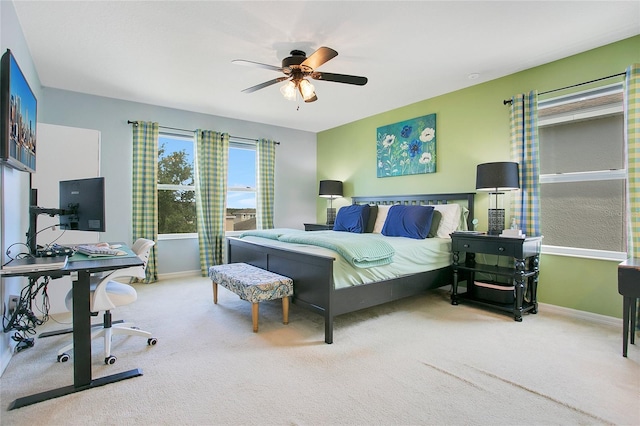 161 Williamson Dr, Davenport, FL 33897 - bedroom with carpet flooring, baseboards, and a ceiling fan