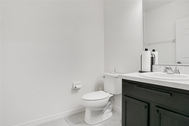 161 Williamson Dr, Davenport, FL 33897 - half bath with toilet, baseboards, tile patterned floors, and vanity