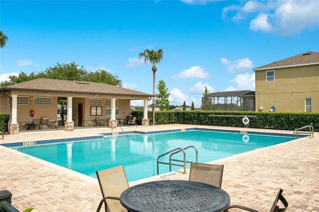 161 Williamson Dr, Davenport, FL 33897 - pool featuring a patio area and fence