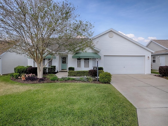 ranch-style house featuring driveway, a garage, and a front lawn