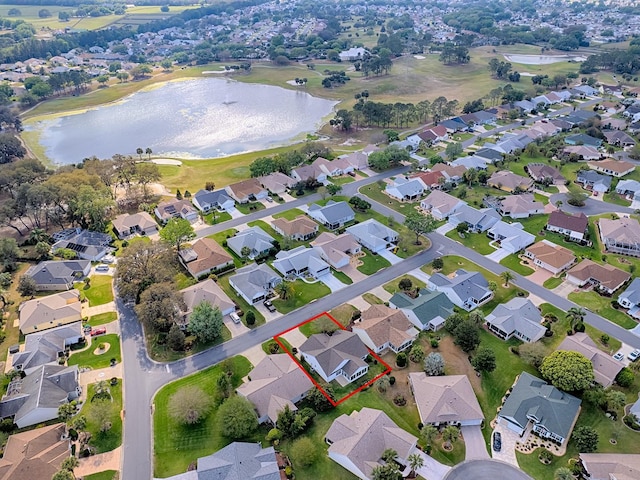 bird's eye view with a water view and a residential view