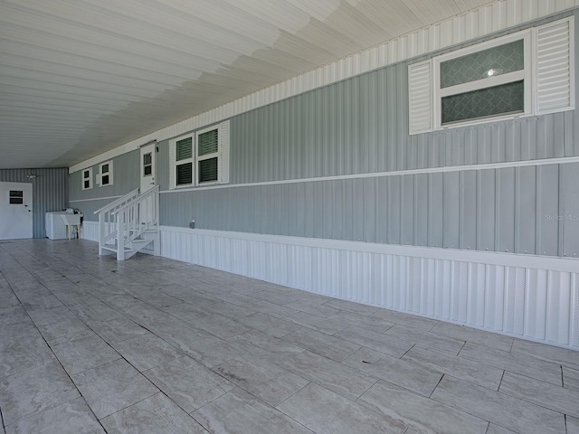 8901 SE 144th Ln, Summerfield, FL 34491 - view of patio featuring entry steps and a carport