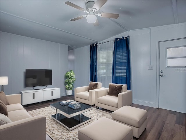 8901 SE 144th Ln, Summerfield, FL 34491 - living room featuring vaulted ceiling, a decorative wall, a ceiling fan, and wood finished floors