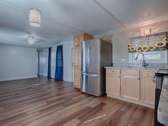 8901 SE 144th Ln, Summerfield, FL 34491 - kitchen featuring a sink, light brown cabinets, dark wood-style floors, freestanding refrigerator, and a ceiling fan