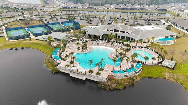 bird's eye view featuring a water view and a residential view