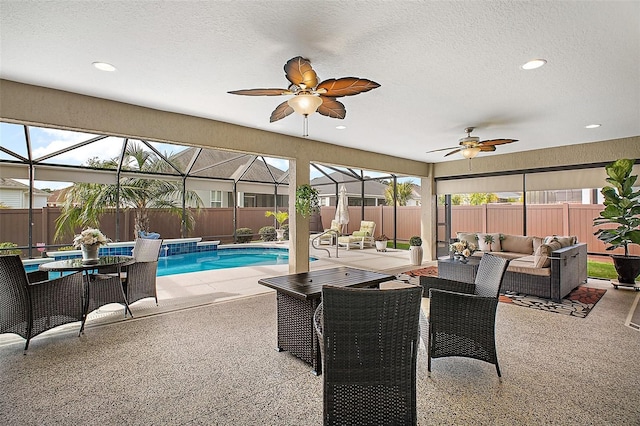 3354 Truluck Pl, Oxford, FL 34484 - view of swimming pool with a patio, an outdoor hangout area, a fenced backyard, and glass enclosure