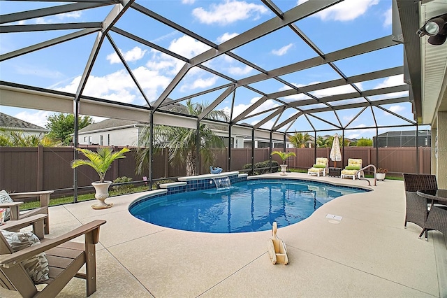 3354 Truluck Pl, Oxford, FL 34484 - view of pool with glass enclosure, a fenced in pool, a fenced backyard, and a patio area