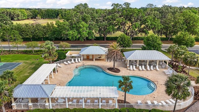3354 Truluck Pl, Oxford, FL 34484 - community pool featuring a gazebo, fence, and a patio