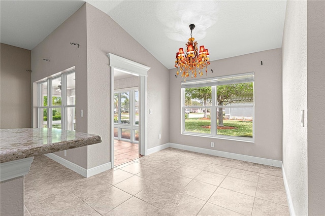 10460 Silver Maple Ave, Oxford, FL 34484 - unfurnished dining area featuring plenty of natural light, lofted ceiling, a chandelier, light tile patterned floors, and baseboards