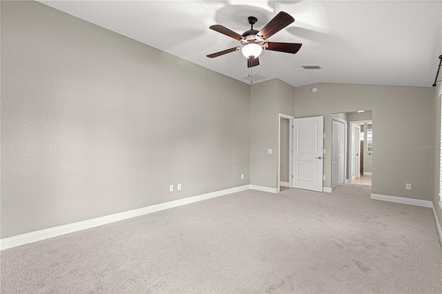 10460 Silver Maple Ave, Oxford, FL 34484 - unfurnished bedroom featuring vaulted ceiling, light colored carpet, baseboards, and a ceiling fan