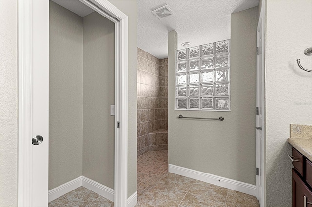 10460 Silver Maple Ave, Oxford, FL 34484 - full bath with walk in shower, vanity, and tile patterned flooring