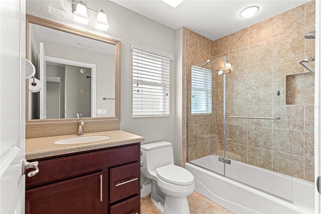 10460 Silver Maple Ave, Oxford, FL 34484 - bathroom with vanity, shower / bath combination with glass door, and toilet