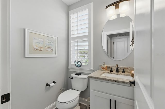 411 S 5th Ave S, Jacksonville Beach, FL 32250 - half bath with toilet, vanity, and baseboards