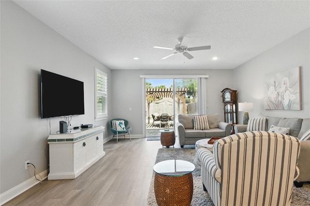 411 S 5th Ave S, Jacksonville Beach, FL 32250 - living area featuring recessed lighting, baseboards, a textured ceiling, ceiling fan, and light wood-style flooring