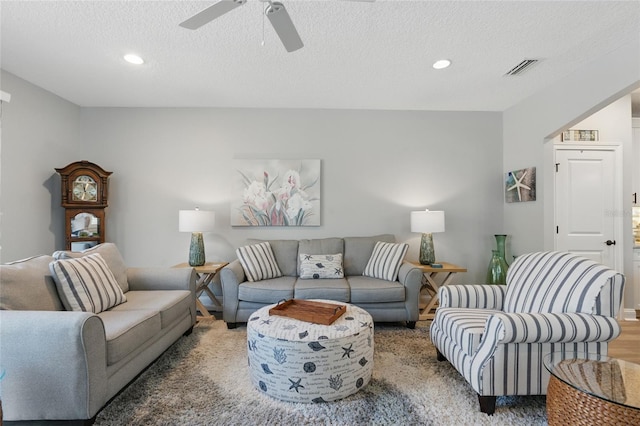 411 S 5th Ave S, Jacksonville Beach, FL 32250 - living area with a ceiling fan, recessed lighting, wood finished floors, and a textured ceiling