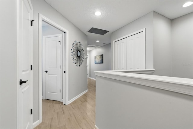 411 S 5th Ave S, Jacksonville Beach, FL 32250 - hallway with light wood-style flooring, baseboards, and recessed lighting