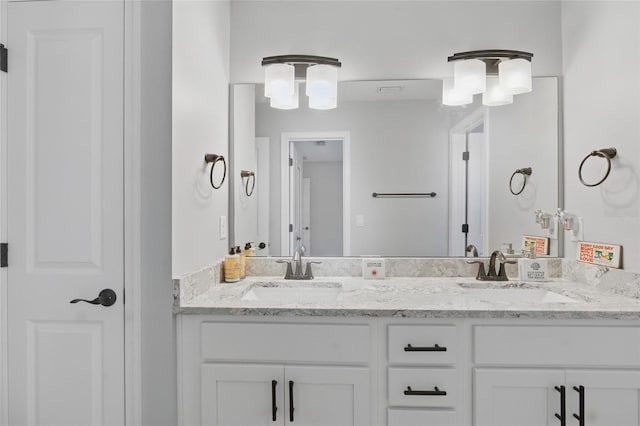 411 S 5th Ave S, Jacksonville Beach, FL 32250 - bathroom featuring double vanity and a sink