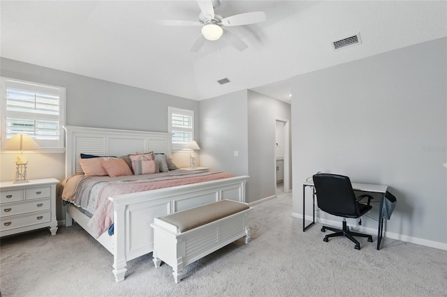 411 S 5th Ave S, Jacksonville Beach, FL 32250 - bedroom featuring light carpet, baseboards, visible vents, and vaulted ceiling