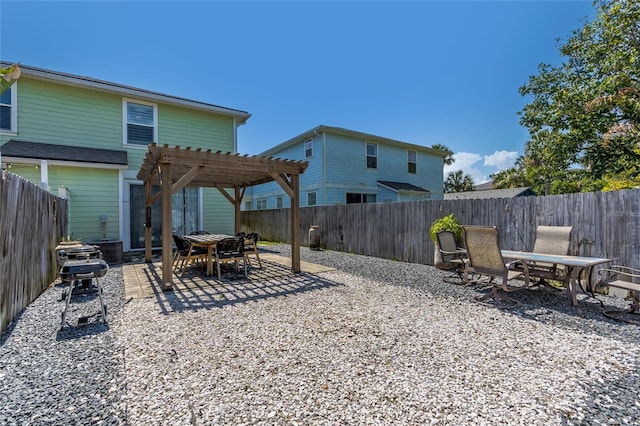 411 S 5th Ave S, Jacksonville Beach, FL 32250 - view of yard with a pergola, a fenced backyard, and a patio area