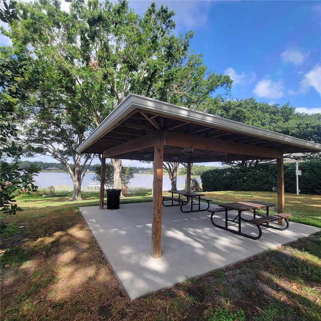 11024 Windchime Cir, Clermont, FL 34711 - view of home's community featuring a gazebo, a patio, and a water view